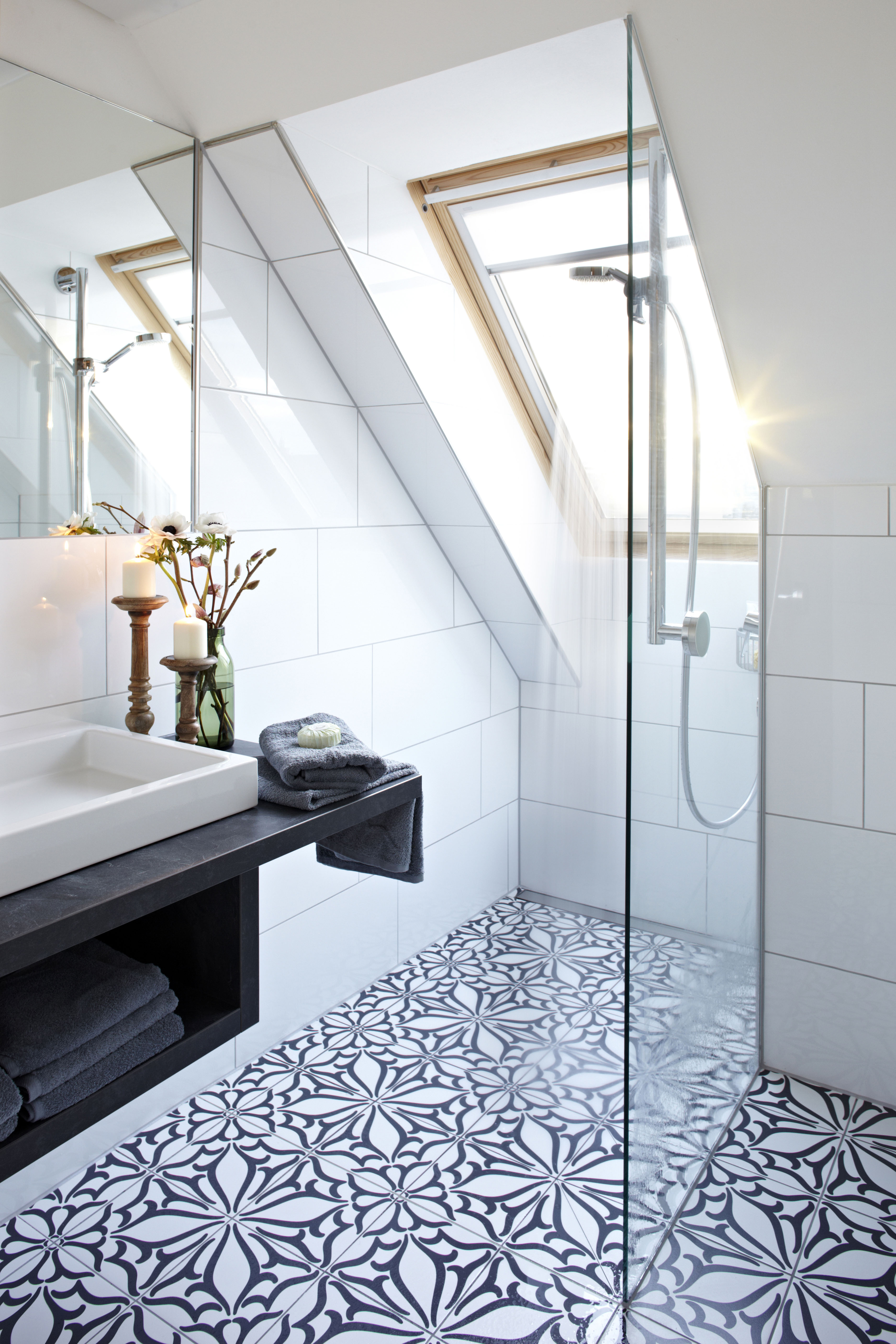Apartment 6 — bathroom with skylight and encaustic floor tile