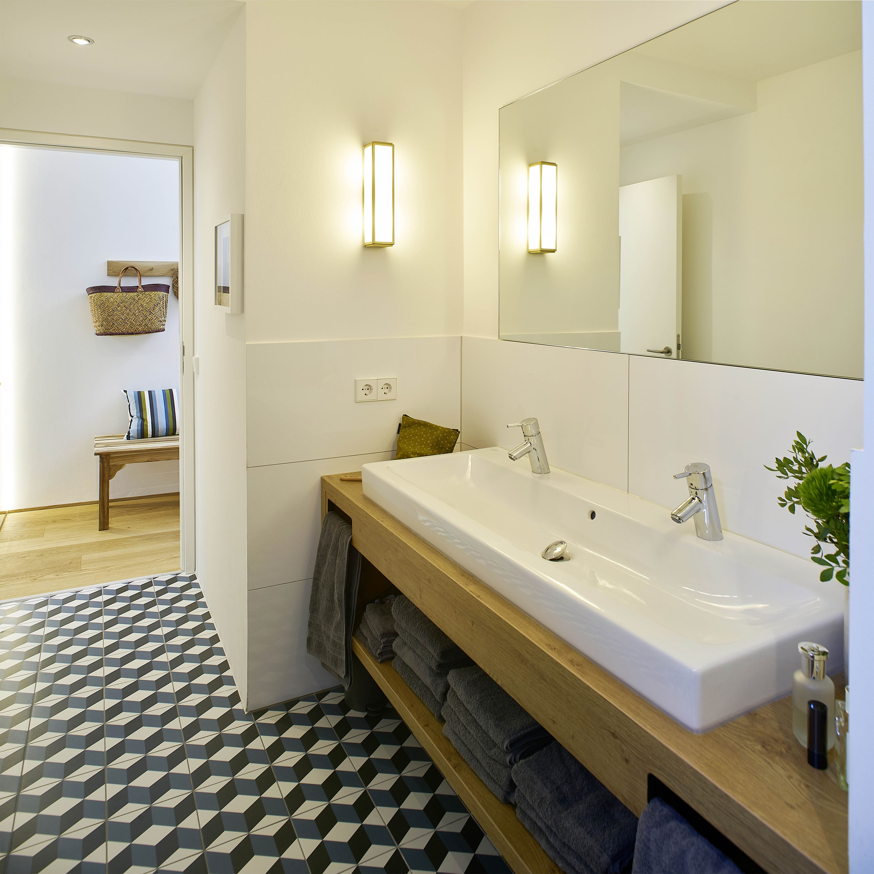 Apartment 8 — bathroom with encaustic tile and double oak vanity