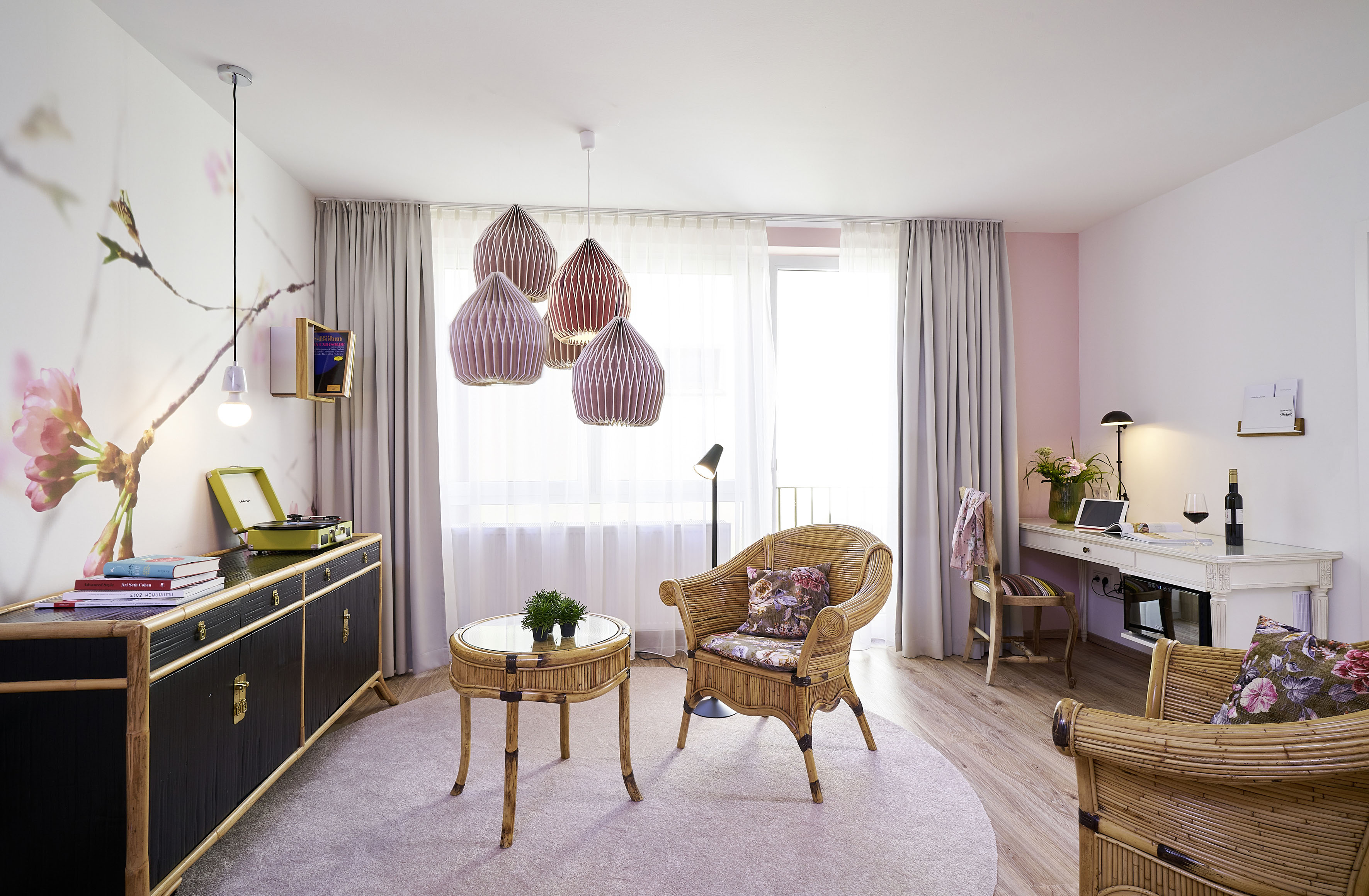Japan room — cherry blossom wallpaper, pink pendants