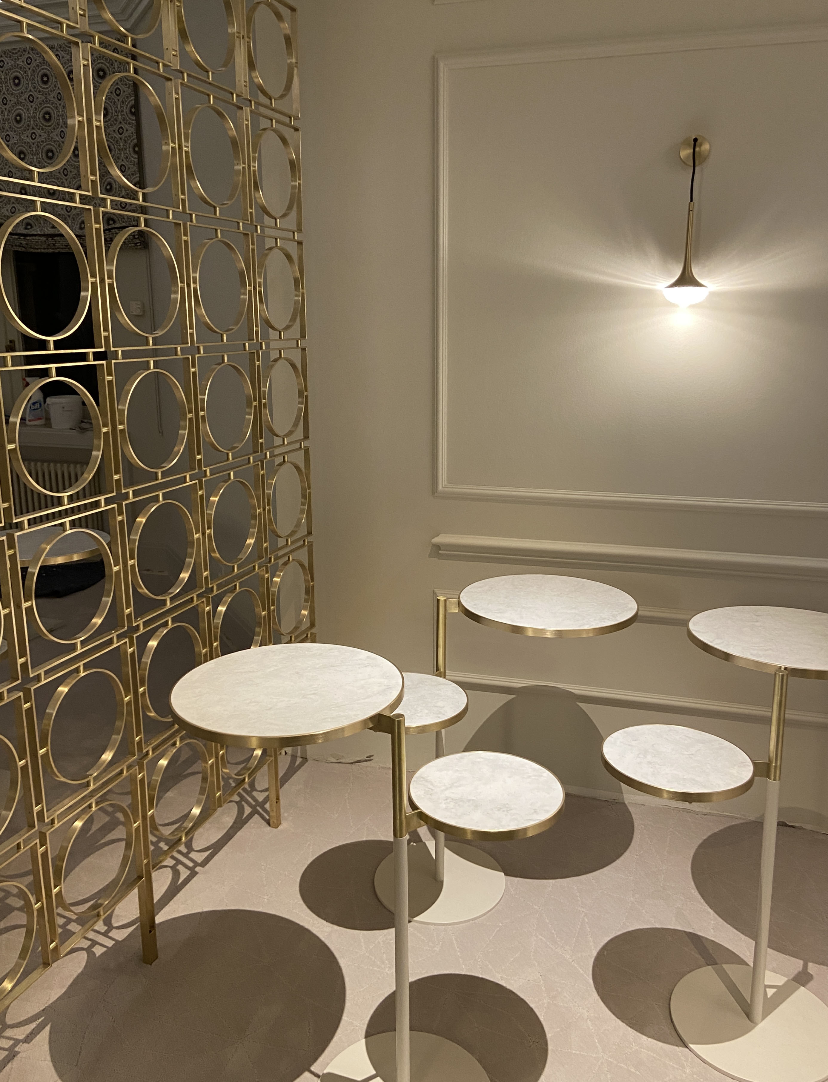 Custom gueridon and brass room divider